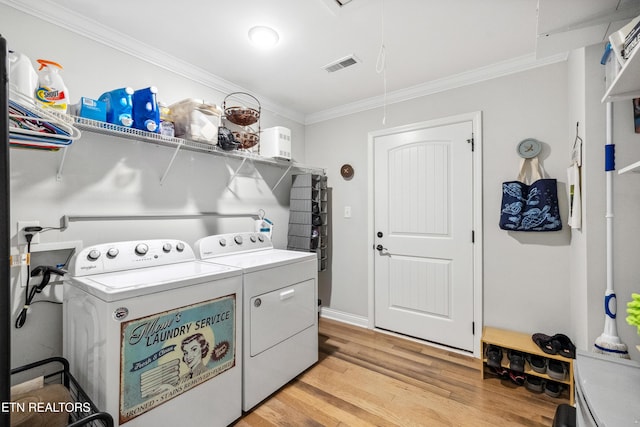 151 Utsesti Way, Loudon, TN 37774 - washroom featuring attic access, crown molding, independent washer and dryer, and light wood-style flooring
