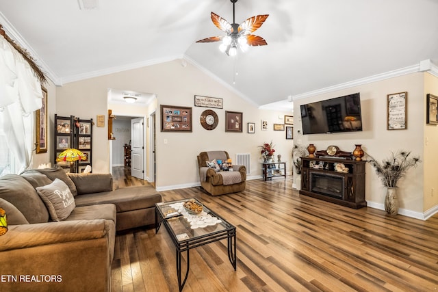 151 Utsesti Way, Loudon, TN 37774 - living room with wood finished floors, a ceiling fan, vaulted ceiling, baseboards, and crown molding