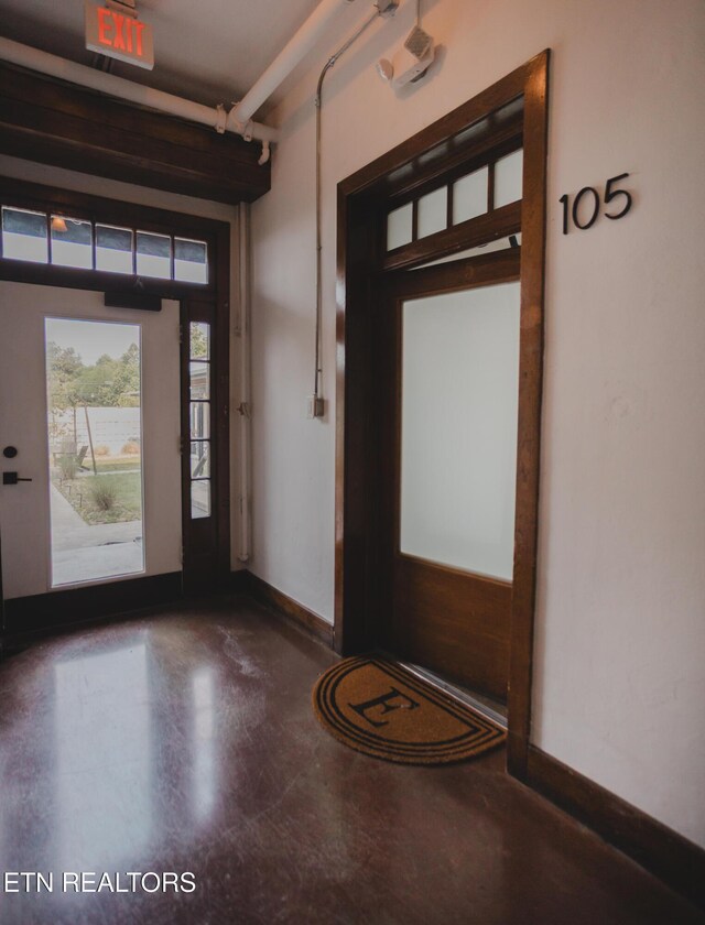 3415 N Broadway St Unit 105, Knoxville, TN 37917 - entrance foyer featuring finished concrete floors and baseboards