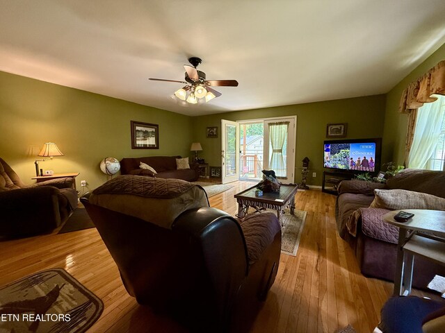 406 Asheville Hwy, Strawberry Plains, TN 37871 - living area with plenty of natural light, wood finished floors, and ceiling fan