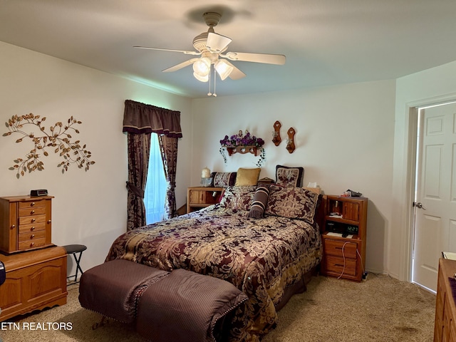 406 Asheville Hwy, Strawberry Plains, TN 37871 - bedroom with light colored carpet and a ceiling fan