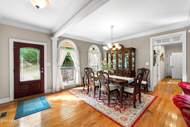 300 County Road 876, Englewood, TN 37329 - dining area featuring a chandelier, light wood-style floors, ornamental molding, and baseboards