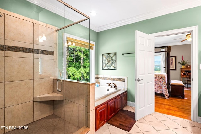 300 County Road 876, Englewood, TN 37329 - ensuite bathroom featuring tile patterned flooring, crown molding, a bath, and a shower stall