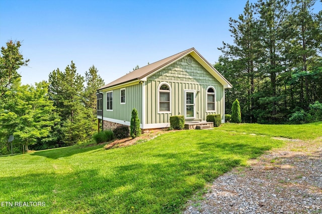 300 County Road 876, Englewood, TN 37329 - view of front of home featuring board and batten siding and a front lawn