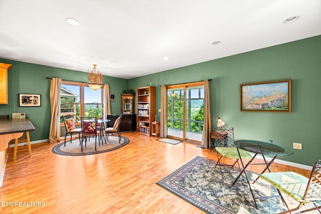 300 County Road 876, Englewood, TN 37329 - dining space with healthy amount of natural light, wood finished floors, a chandelier, baseboards, and recessed lighting
