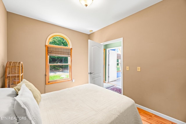 300 County Road 876, Englewood, TN 37329 - bedroom featuring light wood finished floors and baseboards