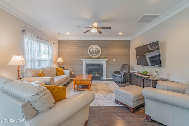 102 Deerberry Ln, Oak Ridge, TN 37830 - living room with a ceiling fan, wood finished floors, crown molding, a glass covered fireplace, and recessed lighting