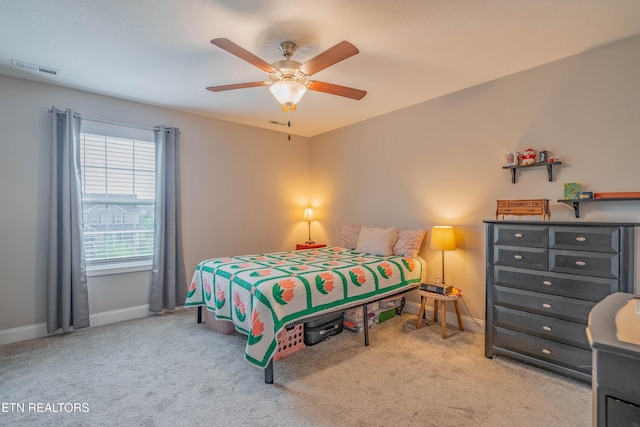 102 Deerberry Ln, Oak Ridge, TN 37830 - carpeted bedroom with baseboards and ceiling fan