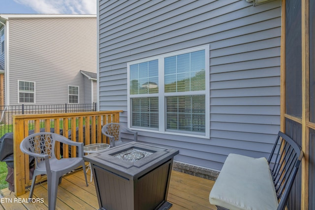 102 Deerberry Ln, Oak Ridge, TN 37830 - deck featuring an outdoor fire pit