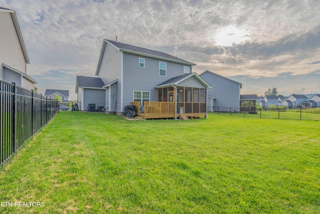 102 Deerberry Ln, Oak Ridge, TN 37830 - back of property featuring a sunroom and a wooden deck