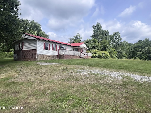 1311 Old Union Rd, Hilham, TN 38568 - view of front of property featuring crawl space, a deck, and a front lawn