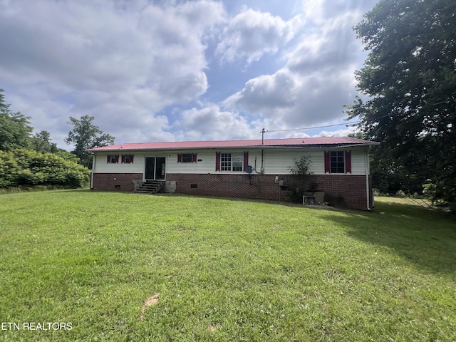1311 Old Union Rd, Hilham, TN 38568 - view of front of house with entry steps, a front yard, crawl space, and metal roof