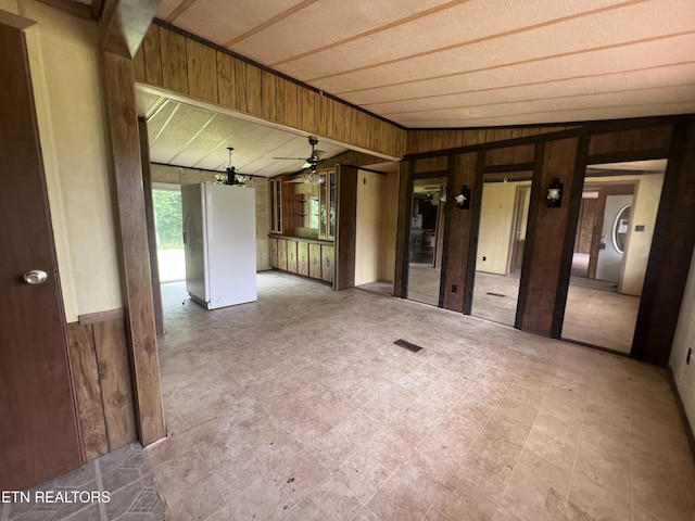 1311 Old Union Rd, Hilham, TN 38568 - spare room with wooden walls and a ceiling fan