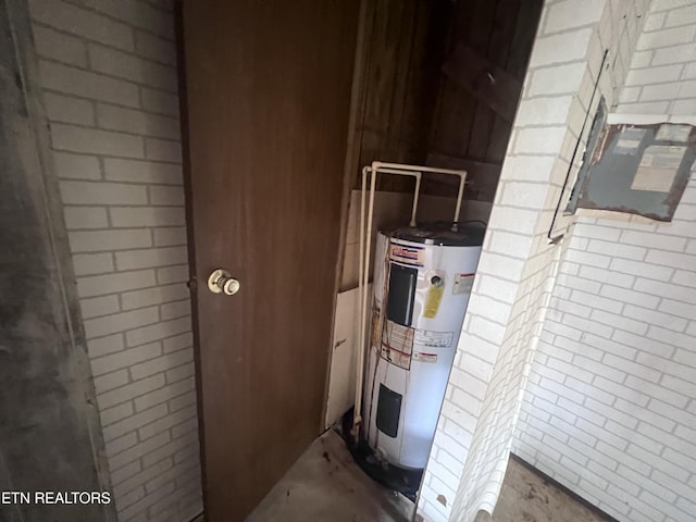 1311 Old Union Rd, Hilham, TN 38568 - utility room featuring electric water heater