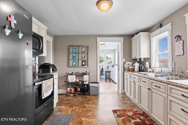 245 Lake Shore Ln, Lafollette, TN 37766 - kitchen featuring stainless steel appliances, light countertops, and stone finish flooring