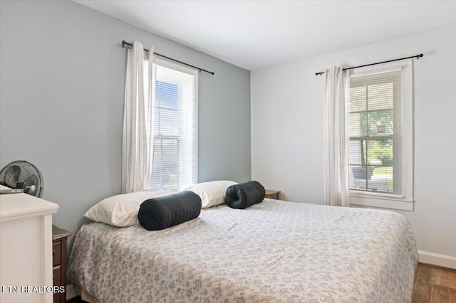 245 Lake Shore Ln, Lafollette, TN 37766 - bedroom with dark wood-style flooring and baseboards