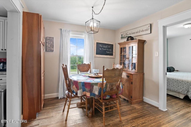 245 Lake Shore Ln, Lafollette, TN 37766 - dining space with dark wood finished floors and a chandelier