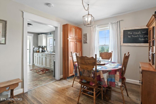 245 Lake Shore Ln, Lafollette, TN 37766 - dining room with light wood-style floors and a chandelier