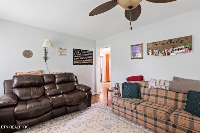 245 Lake Shore Ln, Lafollette, TN 37766 - living room with a ceiling fan and wood finished floors