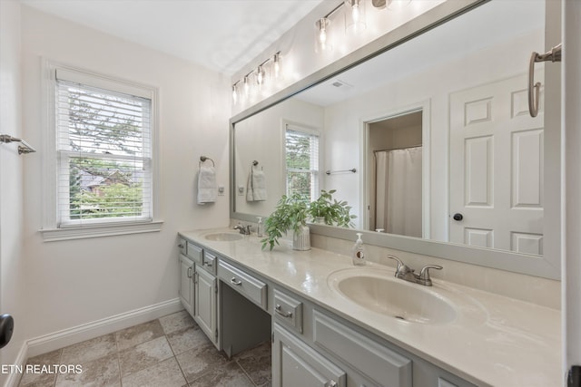 11919 Burnside Pl, Knoxville, TN 37934 - full bath featuring double vanity and baseboards