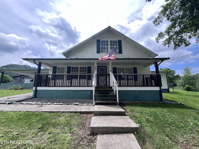 151 Davis Rd, Sneedville, TN 37869 - bungalow-style home with a front lawn and a porch