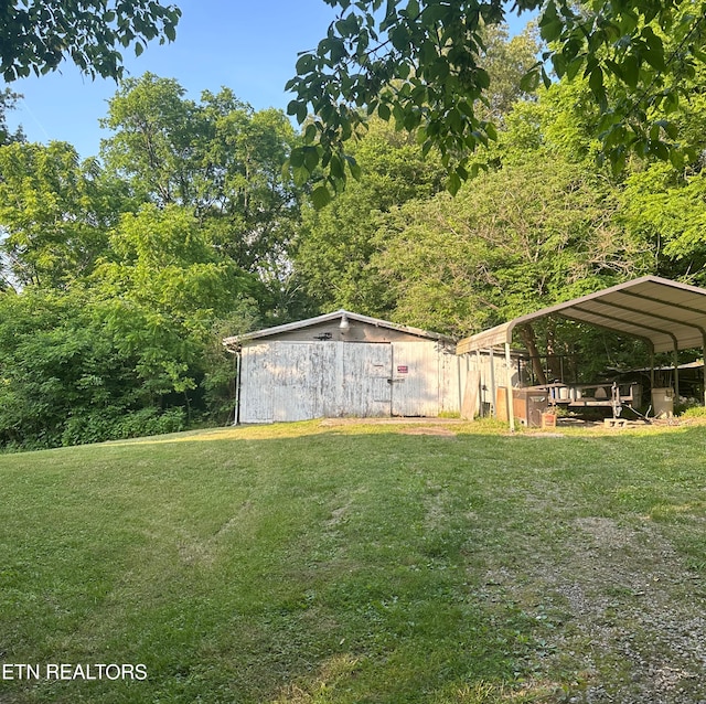 5936 Thorn Grove Pike, Knoxville, TN 37914 - view of green lawn with a detached carport and an outdoor structure