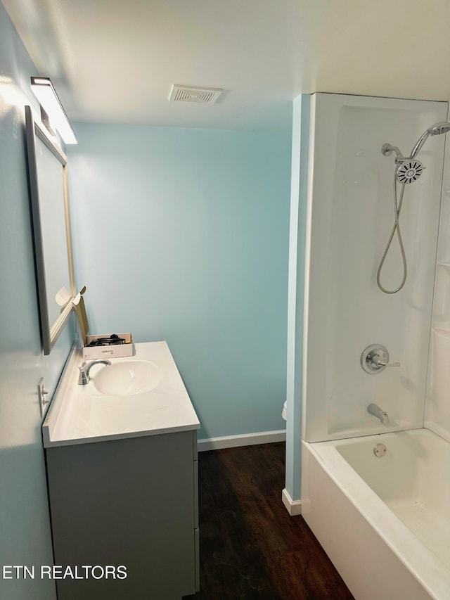 5936 Thorn Grove Pike, Knoxville, TN 37914 - bathroom featuring vanity, wood finished floors, and shower / bathtub combination