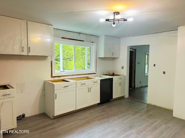 5936 Thorn Grove Pike, Knoxville, TN 37914 - kitchen with dishwasher, light wood finished floors, and white cabinets