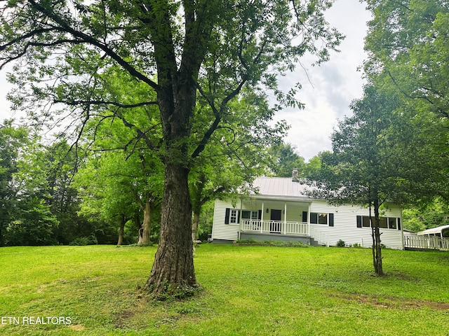5936 Thorn Grove Pike, Knoxville, TN 37914 - view of front of property featuring a porch, a front yard, and a metal roof