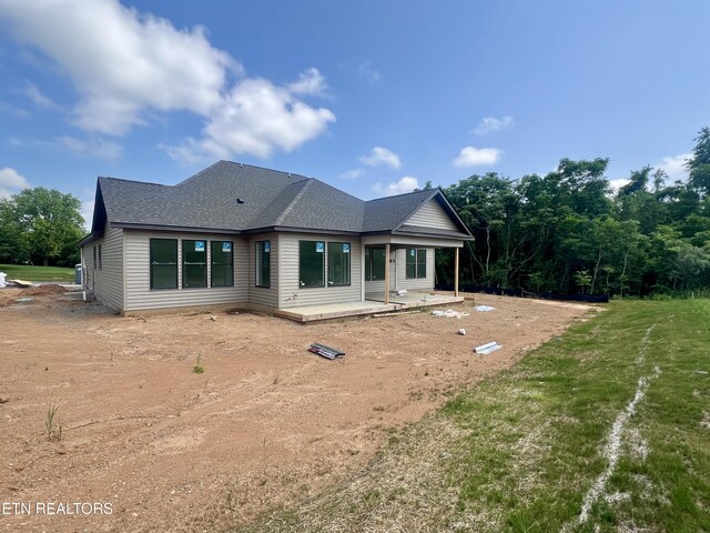 254 Walelu Trl, Vonore, TN 37885 - back of property featuring roof with shingles