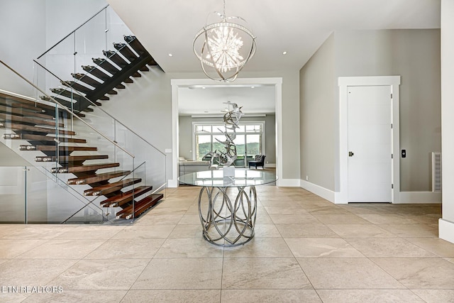 201 Crown Jewel Ln, Lafollette, TN 37766 - foyer entrance with stairway, a chandelier, baseboards, and tile patterned flooring