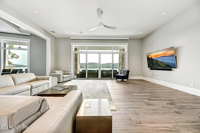 201 Crown Jewel Ln, Lafollette, TN 37766 - living area featuring plenty of natural light, wood finished floors, baseboards, ceiling fan, and recessed lighting