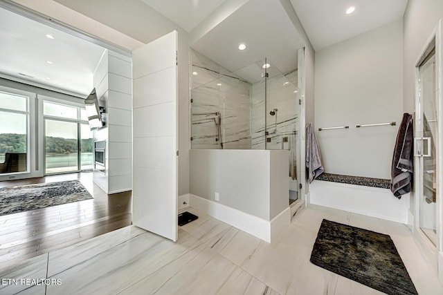 201 Crown Jewel Ln, Lafollette, TN 37766 - bathroom with a marble finish shower, recessed lighting, and baseboards