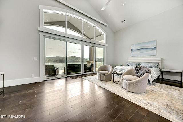 201 Crown Jewel Ln, Lafollette, TN 37766 - living area featuring wood finished floors, high vaulted ceiling, and baseboards