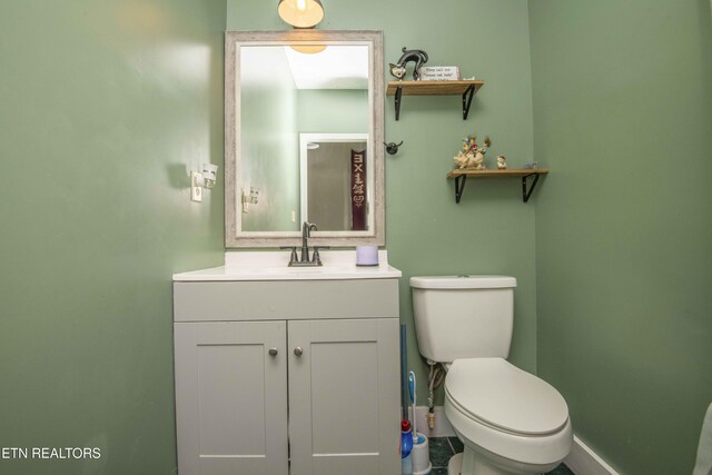 1844 Jackson Rd, Rutledge, TN 37861 - bathroom featuring vanity, toilet, and baseboards