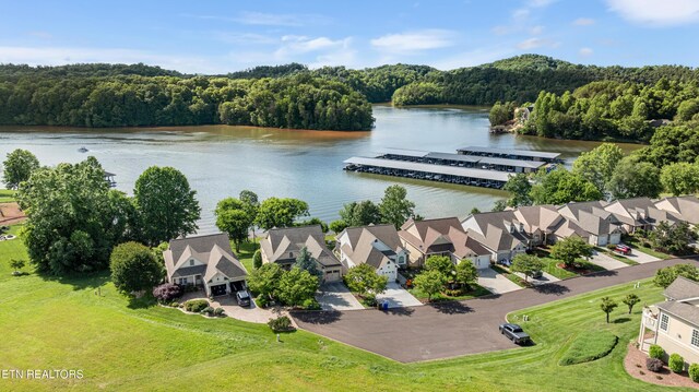 460 Morning Dove Dr, Vonore, TN 37885 - aerial perspective of suburban area featuring a large body of water and a heavily wooded area