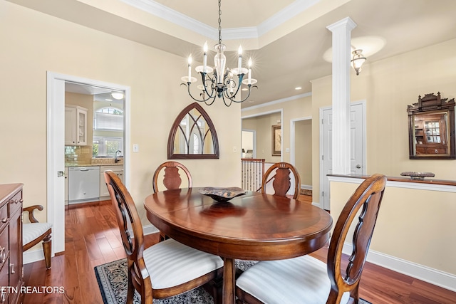 460 Morning Dove Dr, Vonore, TN 37885 - dining area with ornamental molding, dark wood-style floors, baseboards, and a chandelier
