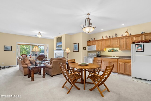 460 Morning Dove Dr, Vonore, TN 37885 - dining space featuring light colored carpet, a fireplace, and recessed lighting