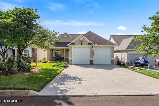 460 Morning Dove Dr, Vonore, TN 37885 - view of front of house with a garage, driveway, stone siding, and a front yard