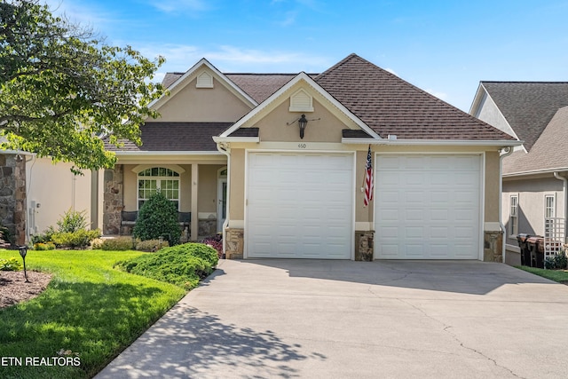 460 Morning Dove Dr, Vonore, TN 37885 - traditional home with stone siding, stucco siding, a garage, and concrete driveway