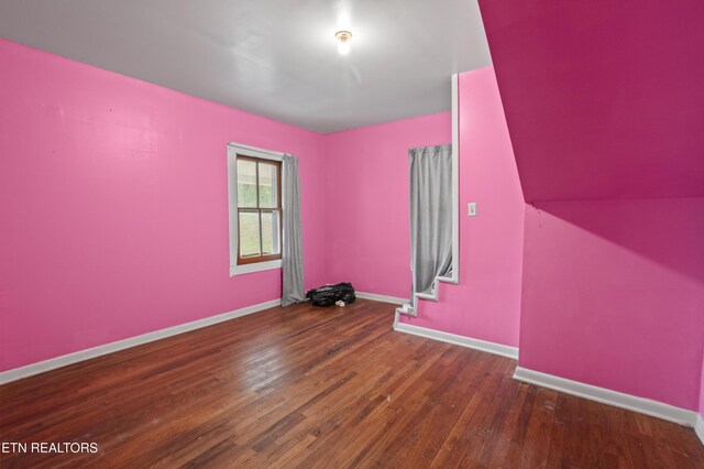 138 Bethlehem Ln, Lafollette, TN 37766 - spare room featuring wood finished floors, baseboards, and stairs