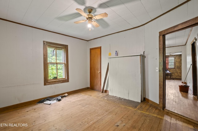 138 Bethlehem Ln, Lafollette, TN 37766 - unfurnished bedroom with wood-type flooring, ornamental molding, and ceiling fan