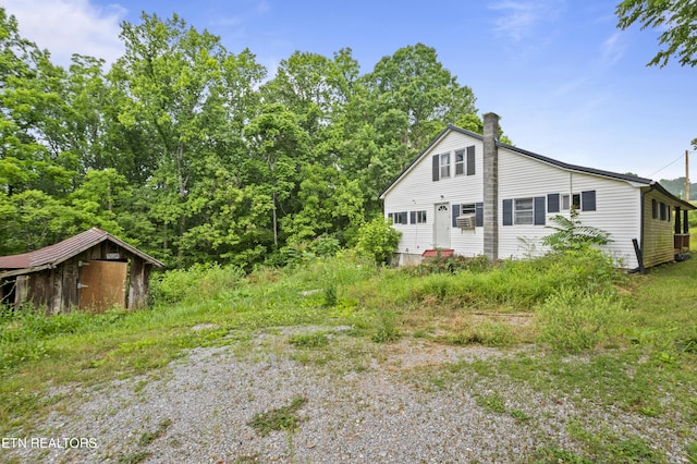 138 Bethlehem Ln, Lafollette, TN 37766 - view of side of home featuring a chimney