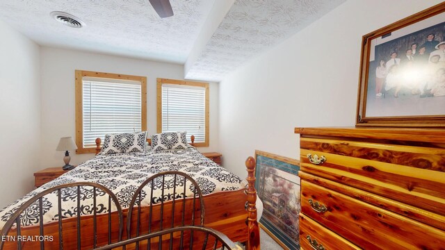 1464 Blue Mill Rd, Del Rio, TN 37727 - carpeted bedroom featuring ceiling fan and a textured ceiling