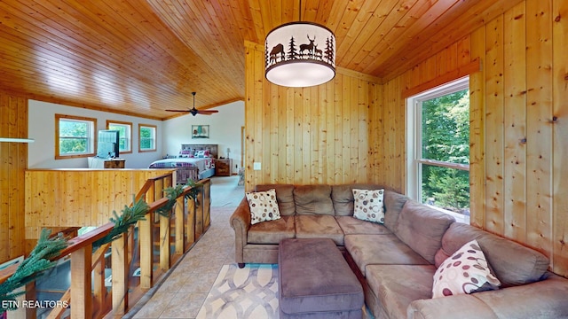1464 Blue Mill Rd, Del Rio, TN 37727 - tiled living area featuring vaulted ceiling, wooden walls, plenty of natural light, wooden ceiling, and ceiling fan