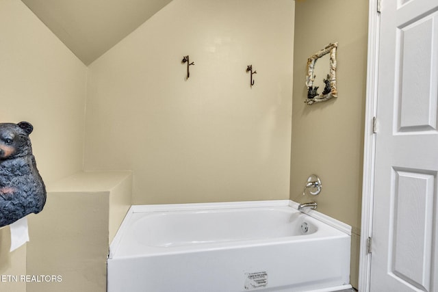 1707 Brookview Dr, Dandridge, TN 37725 - bathroom featuring a bath and lofted ceiling