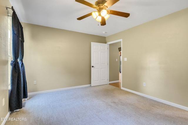 1707 Brookview Dr, Dandridge, TN 37725 - empty room featuring light colored carpet, baseboards, and ceiling fan