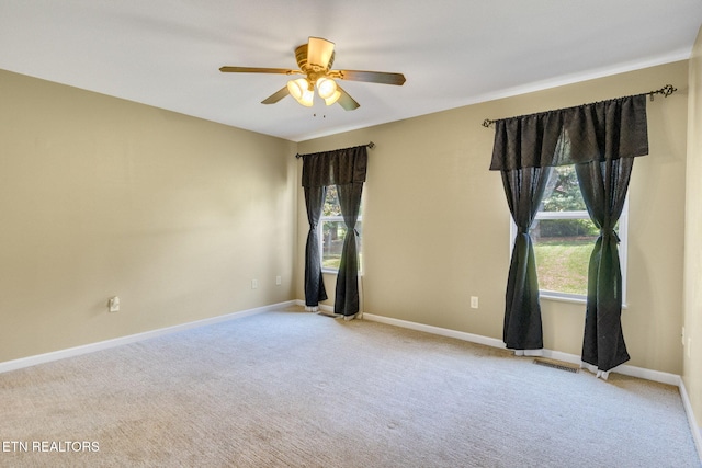 1707 Brookview Dr, Dandridge, TN 37725 - carpeted spare room with plenty of natural light, ceiling fan, and baseboards