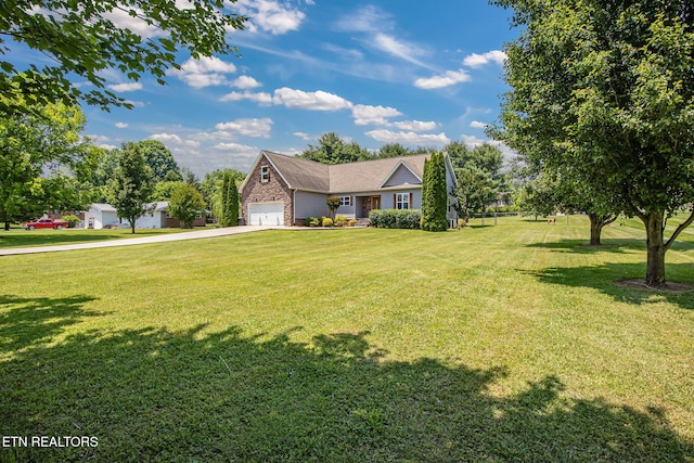 1707 Brookview Dr, Dandridge, TN 37725 - view of front of house featuring a front yard, driveway, and an attached garage