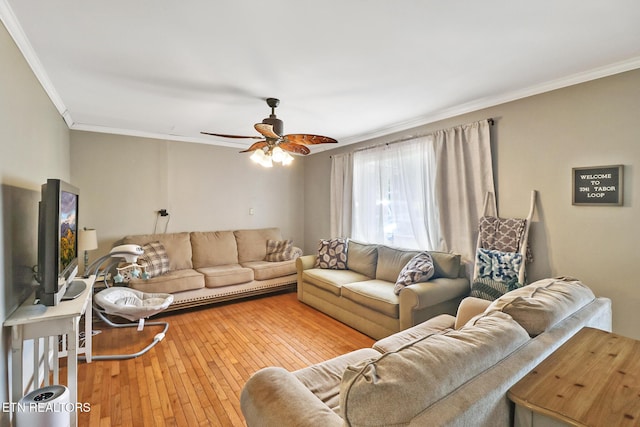 3341 Tabor Loop, Crossville, TN 38571 - living room with crown molding, a ceiling fan, and light wood-style floors